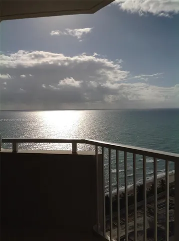 a view of balcony with ocean view