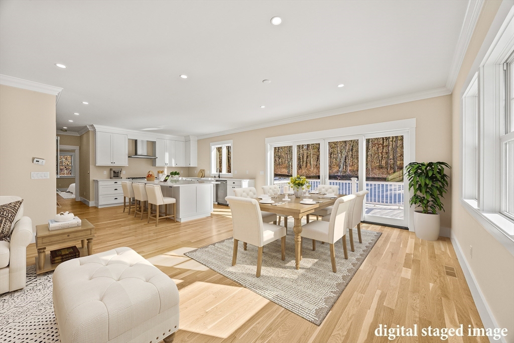 1025 Orleans Road Harwich, MA 02645 - Photo 11 of 39 a living room with lots of furniture and a wooden floor