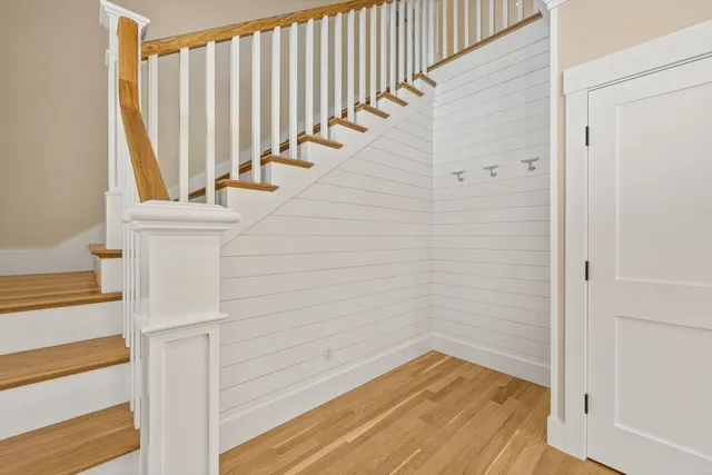 a view of entryway with wooden floor