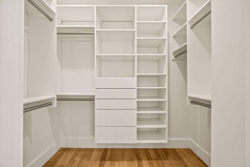 1025 Orleans Road Harwich, MA 02645 - Photo 31 of 39 a view of walk in closet with empty racks