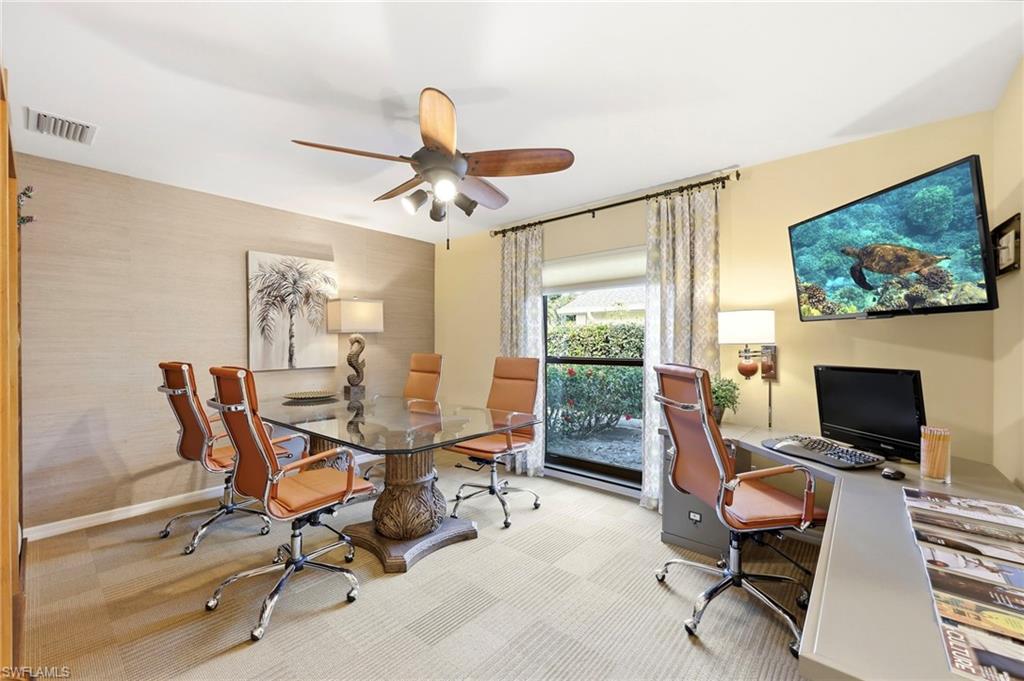 2274 Queens Way Naples, FL 34112 - Photo 26 of 32 a view of a livingroom with workspace and a window
