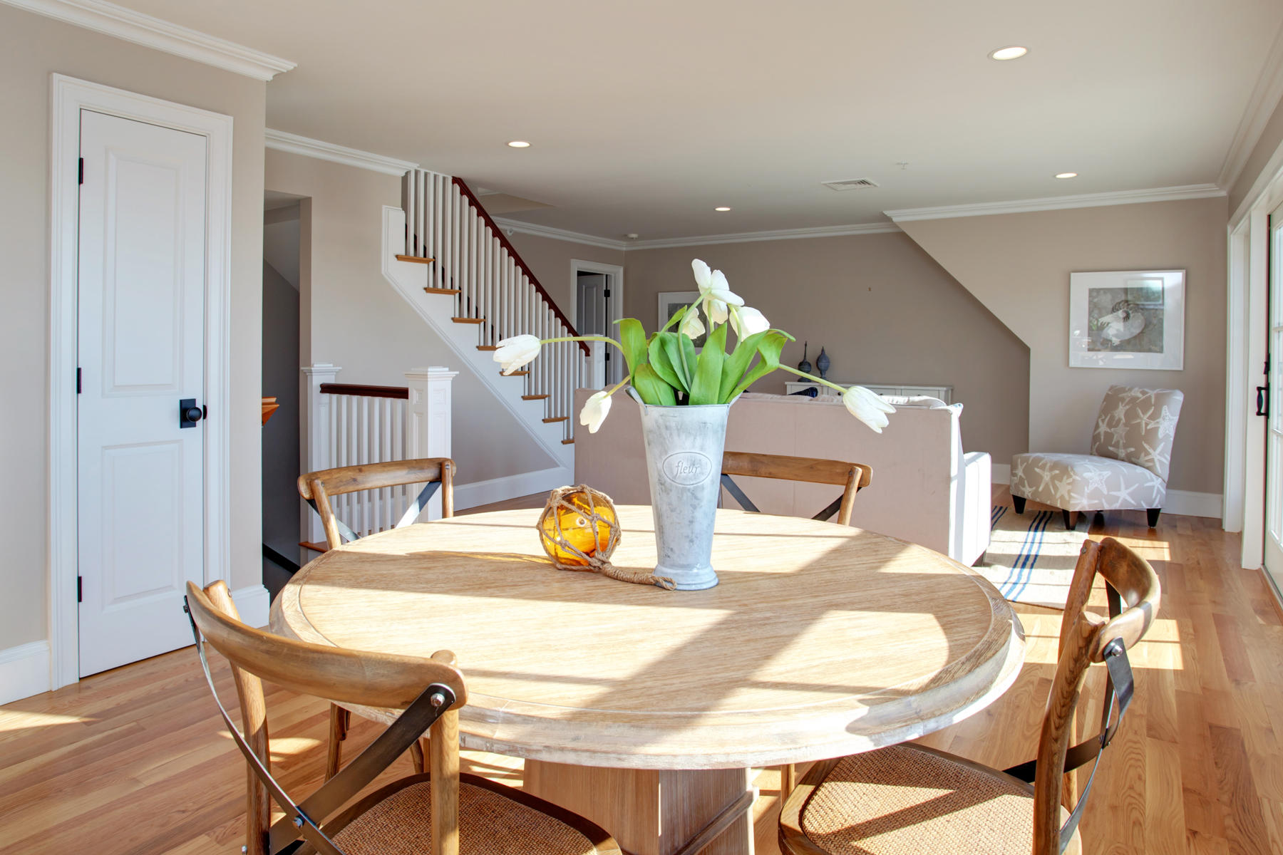 1090 Shore Road, Unit 2 Pocasset, MA 02559 - Photo 10 of 28 a view of a dining room with furniture and wooden floor