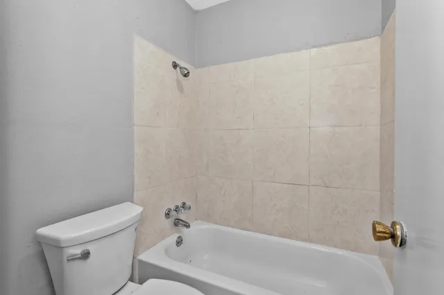 a view of a street with a building in the background