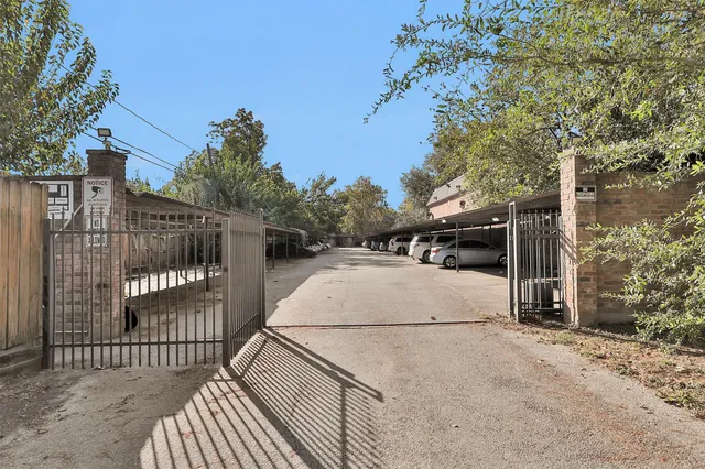 a view of a street with cars