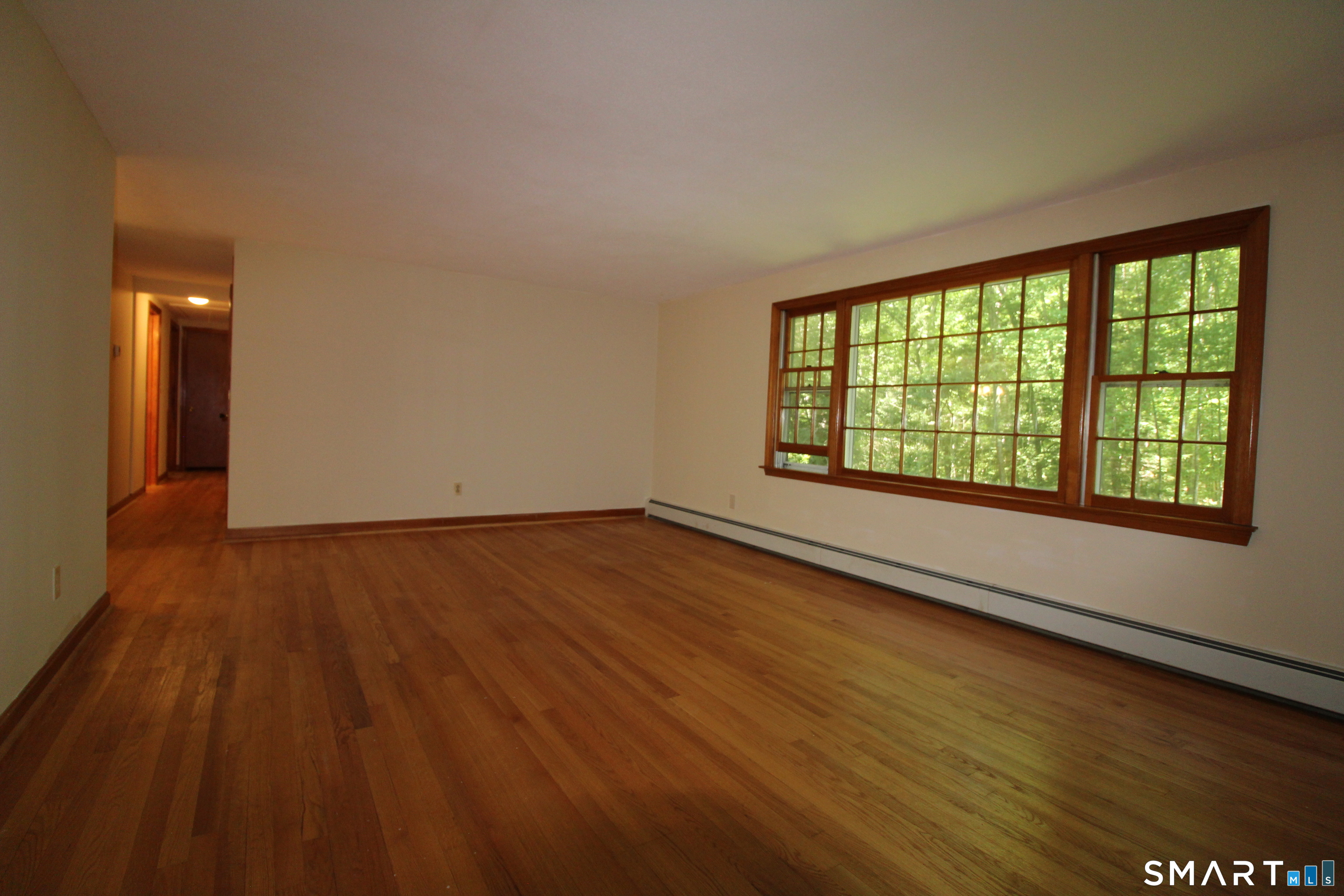 67 Mulberry Road Mansfield, CT 06250 - Photo 18 of 27 Living room with fireplace freshly painted.