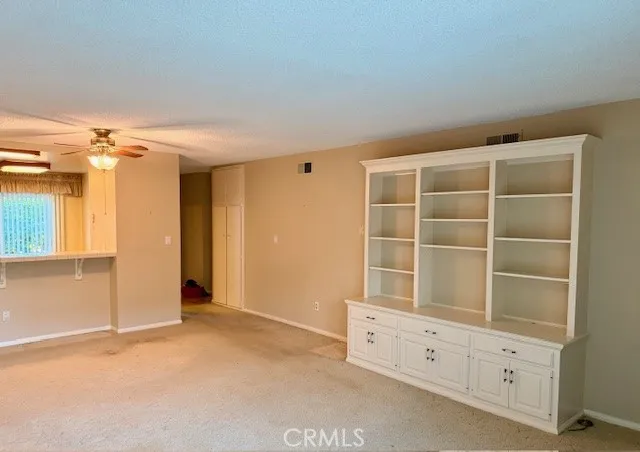 17708 La Rosa Lane Fountain Valley, CA 92708 - Photo 2 of 4 Living Room with lovely built-in cabinet
