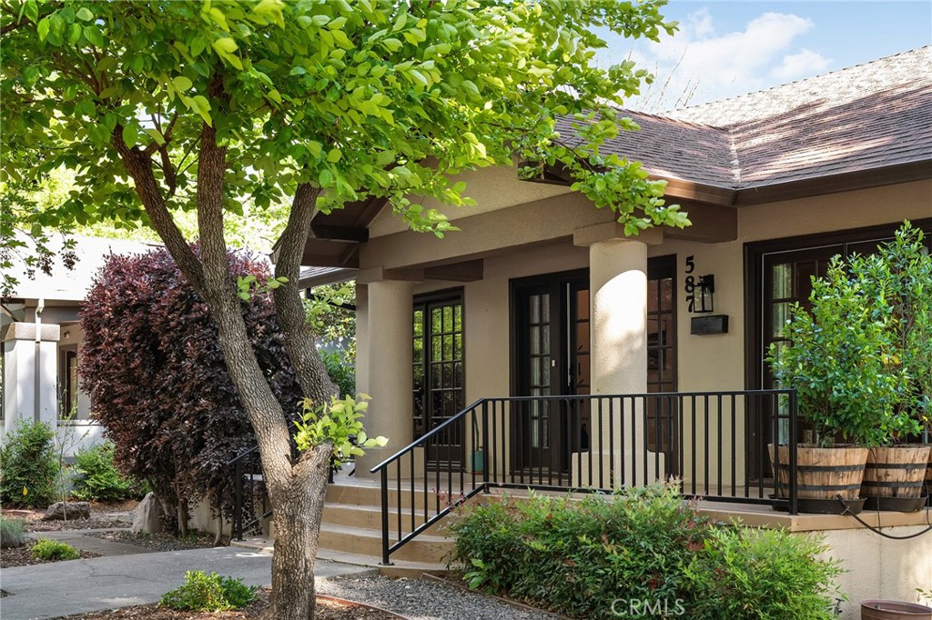 587 East 3rd Street Chico, CA 95928 - Photo 13 of 73 a front view of a house with a tree