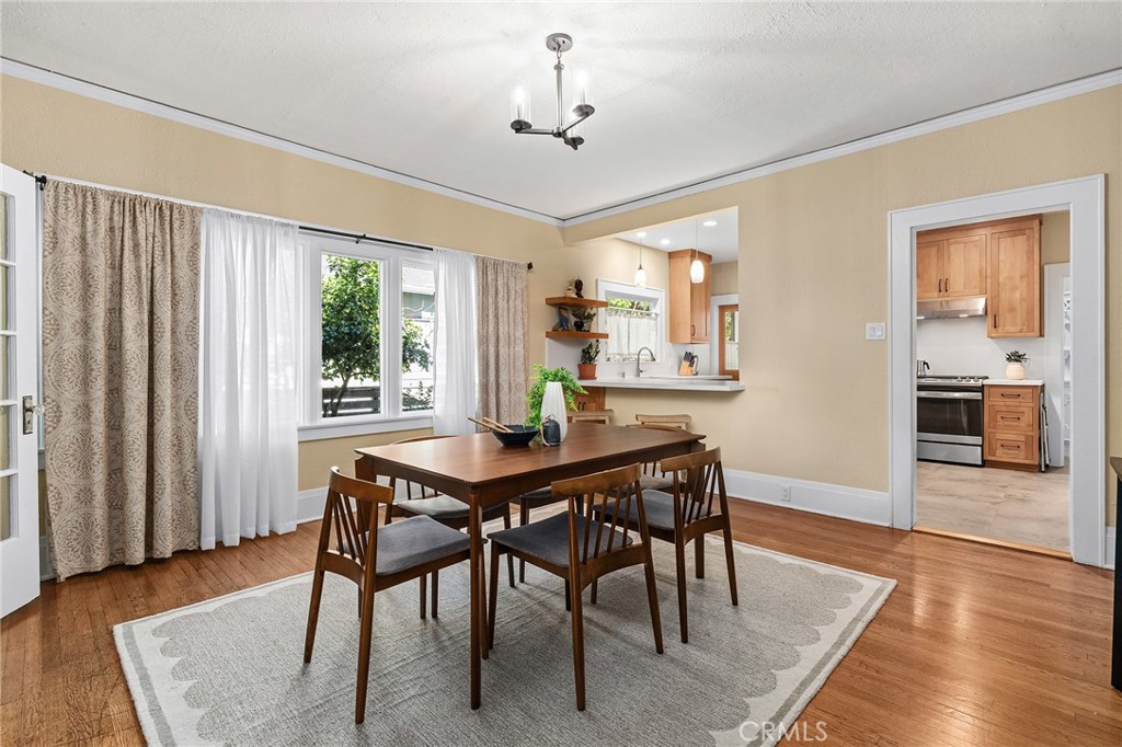 587 East 3rd Street Chico, CA 95928 - Photo 25 of 73 a view of a dining room with furniture window and wooden floor