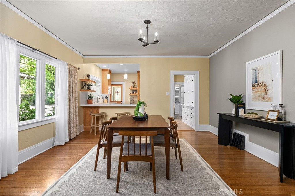 587 East 3rd Street Chico, CA 95928 - Photo 26 of 73 a view of a dining room with furniture window and wooden floor