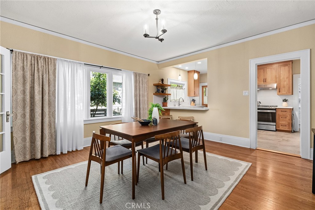 587 East 3rd Street Chico, CA 95928 - Photo 3 of 73 a view of a dining room with furniture window and wooden floor
