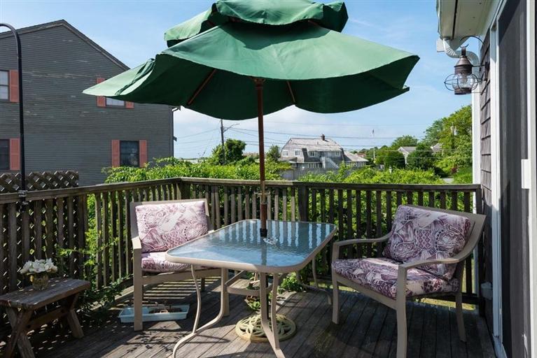 165 Bay Shore Road Hyannis, MA 02601 - Photo 14 of 26 a view of a chairs and table in the balcony