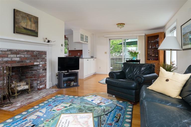 165 Bay Shore Road Hyannis, MA 02601 - Photo 6 of 26 a living room with furniture and a fireplace