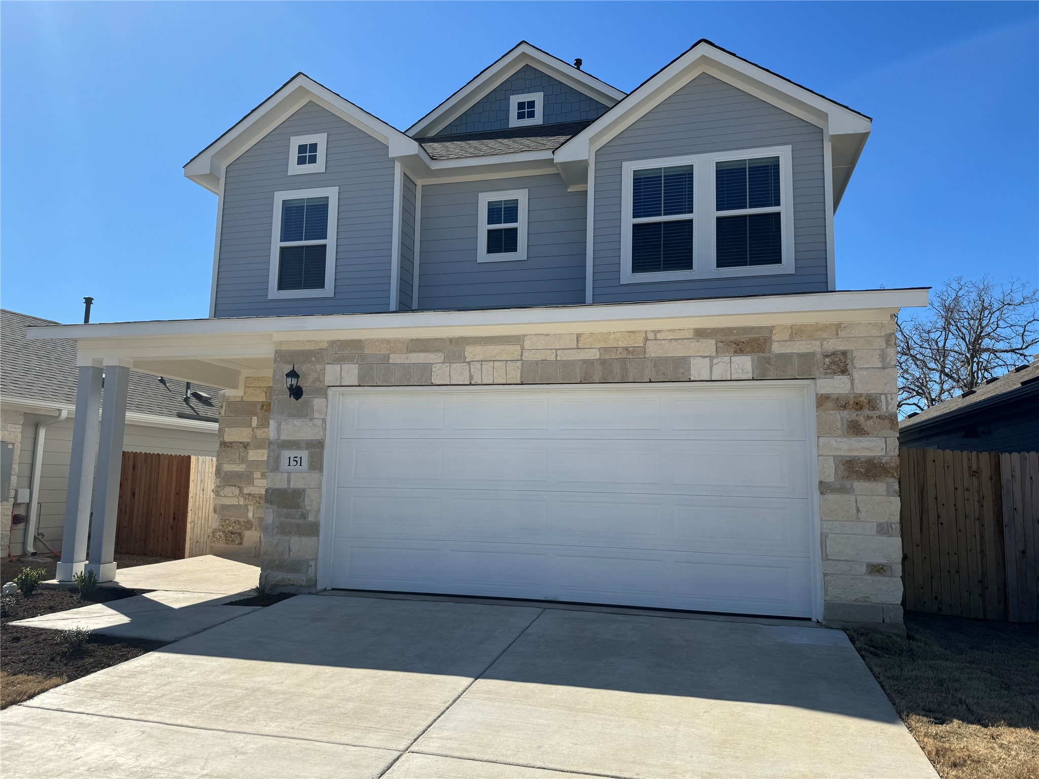 151 Bent Crk Lane Georgetown, TX 78628 - Photo 1 of 17 a front view of a house with a garage