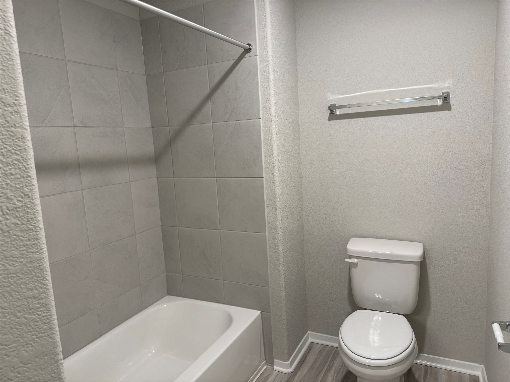 151 Bent Crk Lane Georgetown, TX 78628 - Photo 14 of 17 a white toilet sitting next to a bath tub
