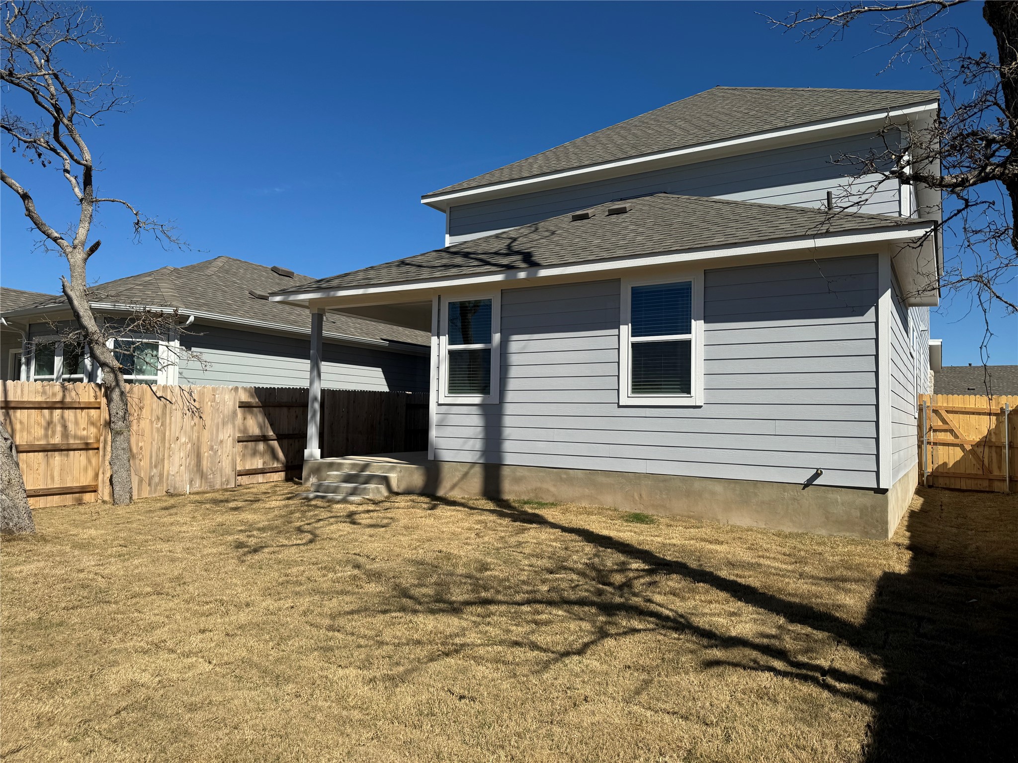 151 Bent Crk Lane Georgetown, TX 78628 - Photo 16 of 17 a view of a house with a patio
