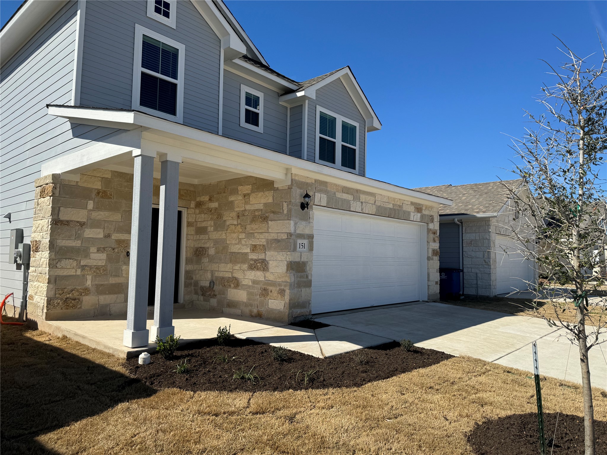 151 Bent Crk Lane Georgetown, TX 78628 - Photo 2 of 17 a front view of a house with a yard