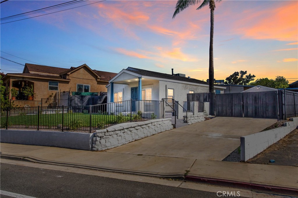 1838 Main Street Riverside, CA 92501 - Photo 1 of 1 a front view of a house with garden