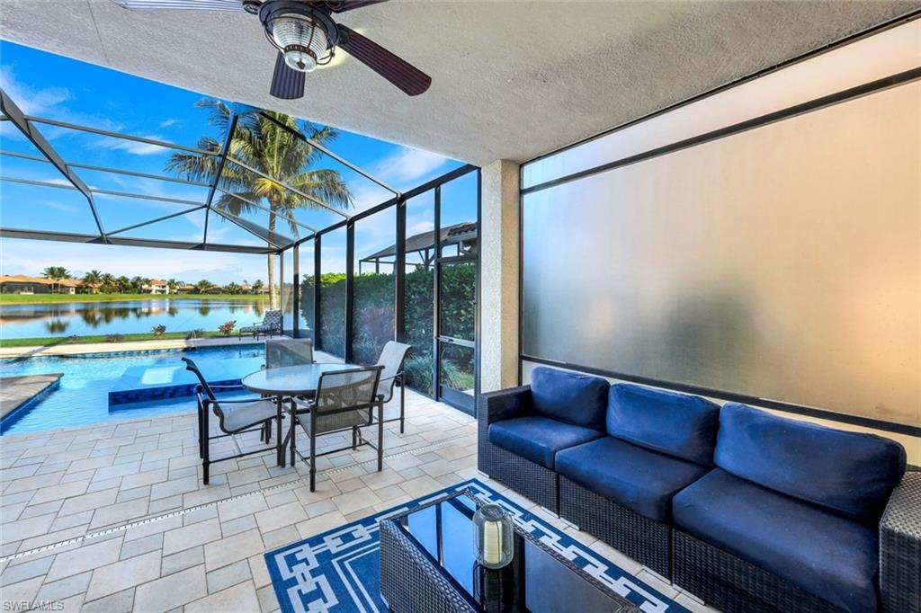 2735 Cinnamon Bay Circle Naples, FL 34119 - Photo 30 of 50 a outdoor living space with furniture