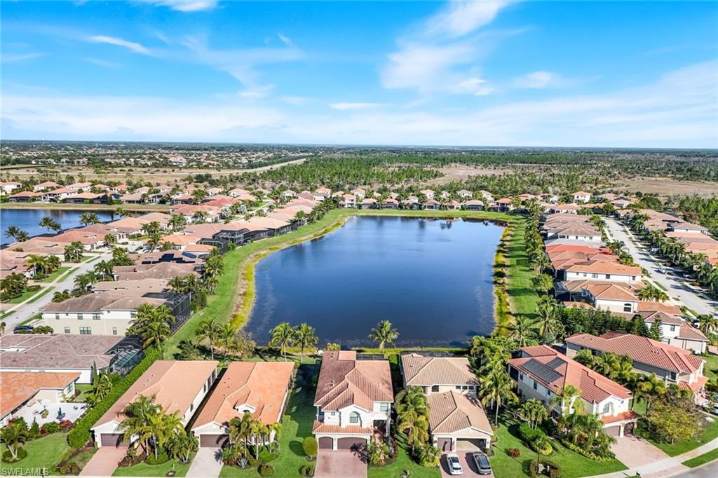 2735 Cinnamon Bay Circle Naples, FL 34119 - Photo 43 of 50 an aerial view of residential houses with outdoor space