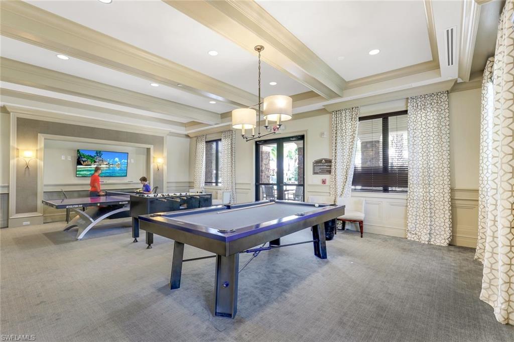 2735 Cinnamon Bay Circle Naples, FL 34119 - Photo 49 of 50 a dining room with furniture and window