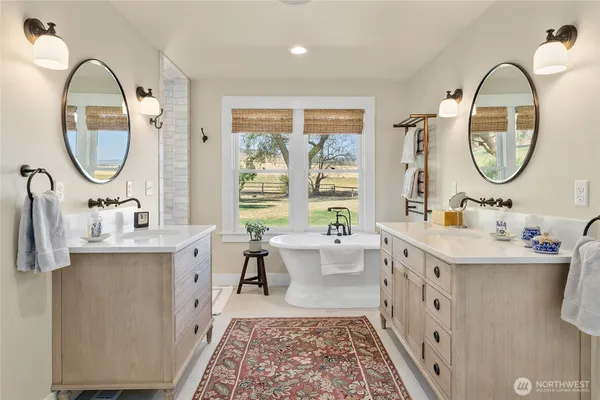a living room with furniture fireplace and a window