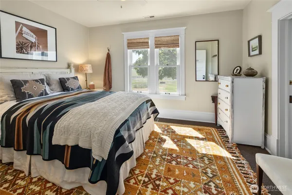 a spacious bathroom with a toilet sink and bathtub