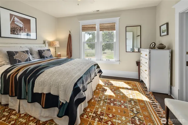 a spacious bathroom with a toilet sink and bathtub