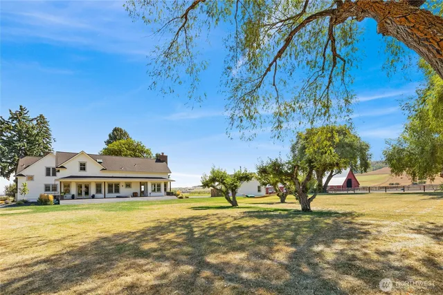 a view of swimming pool with an outdoor space and seating