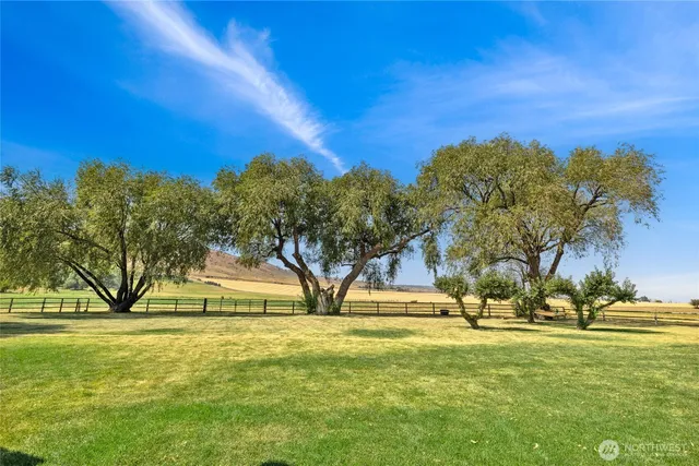 an outdoor view of a building with garden