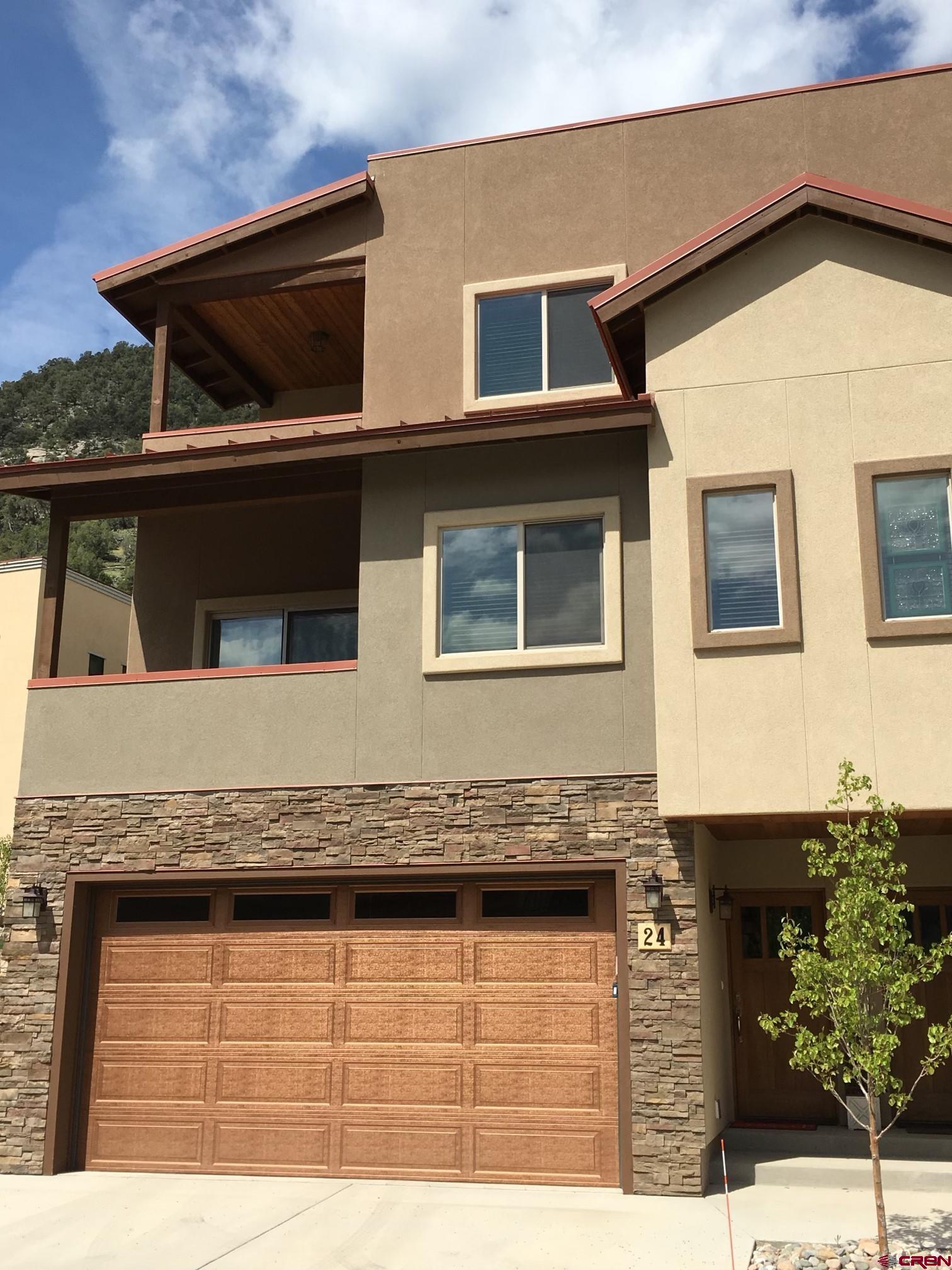 a house view with a outdoor space