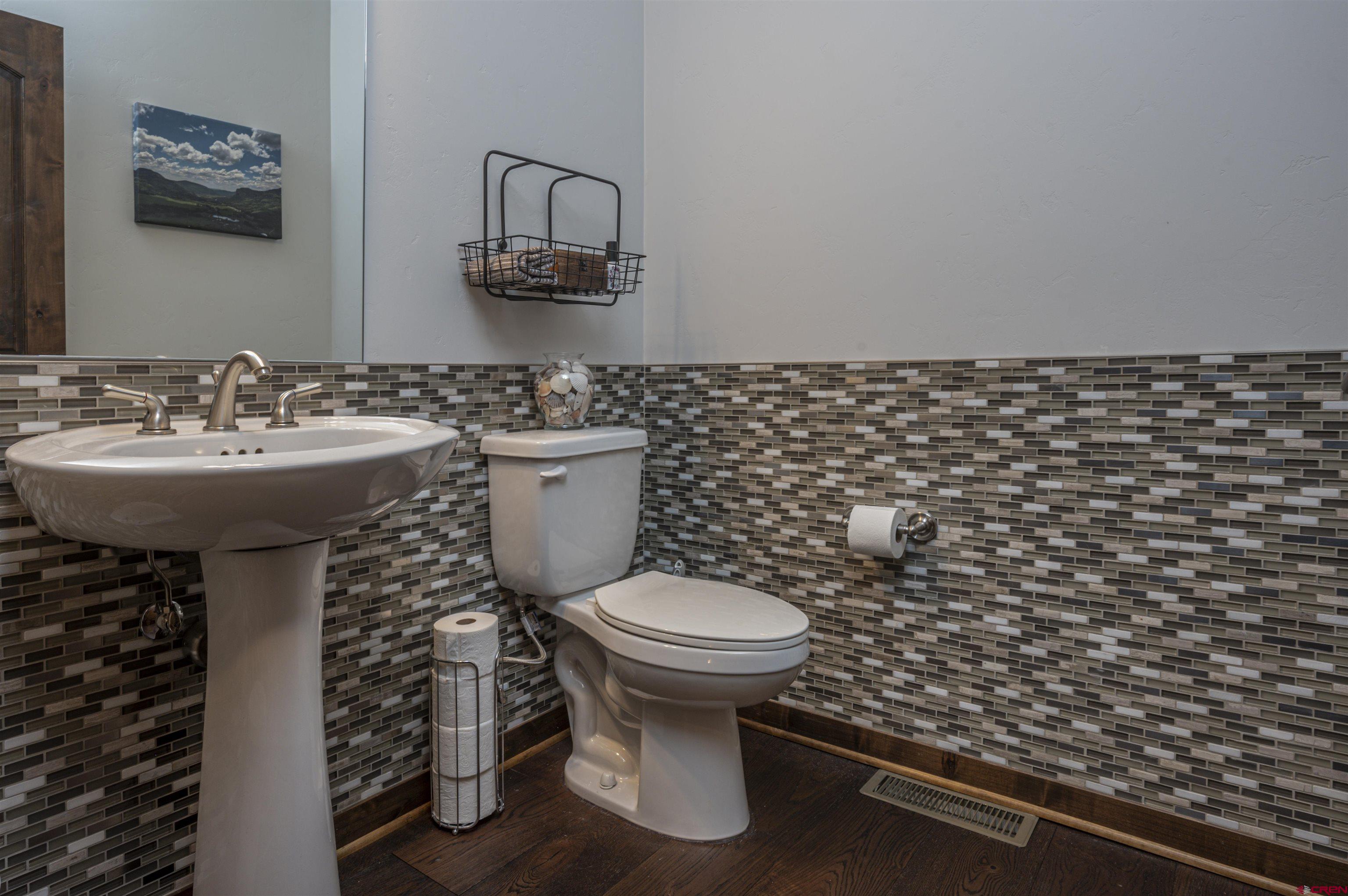 1422 Animas View Drive, Unit 24 Durango, CO 81301 - Photo 12 of 23 a bathroom with a sink toilet and a mirror