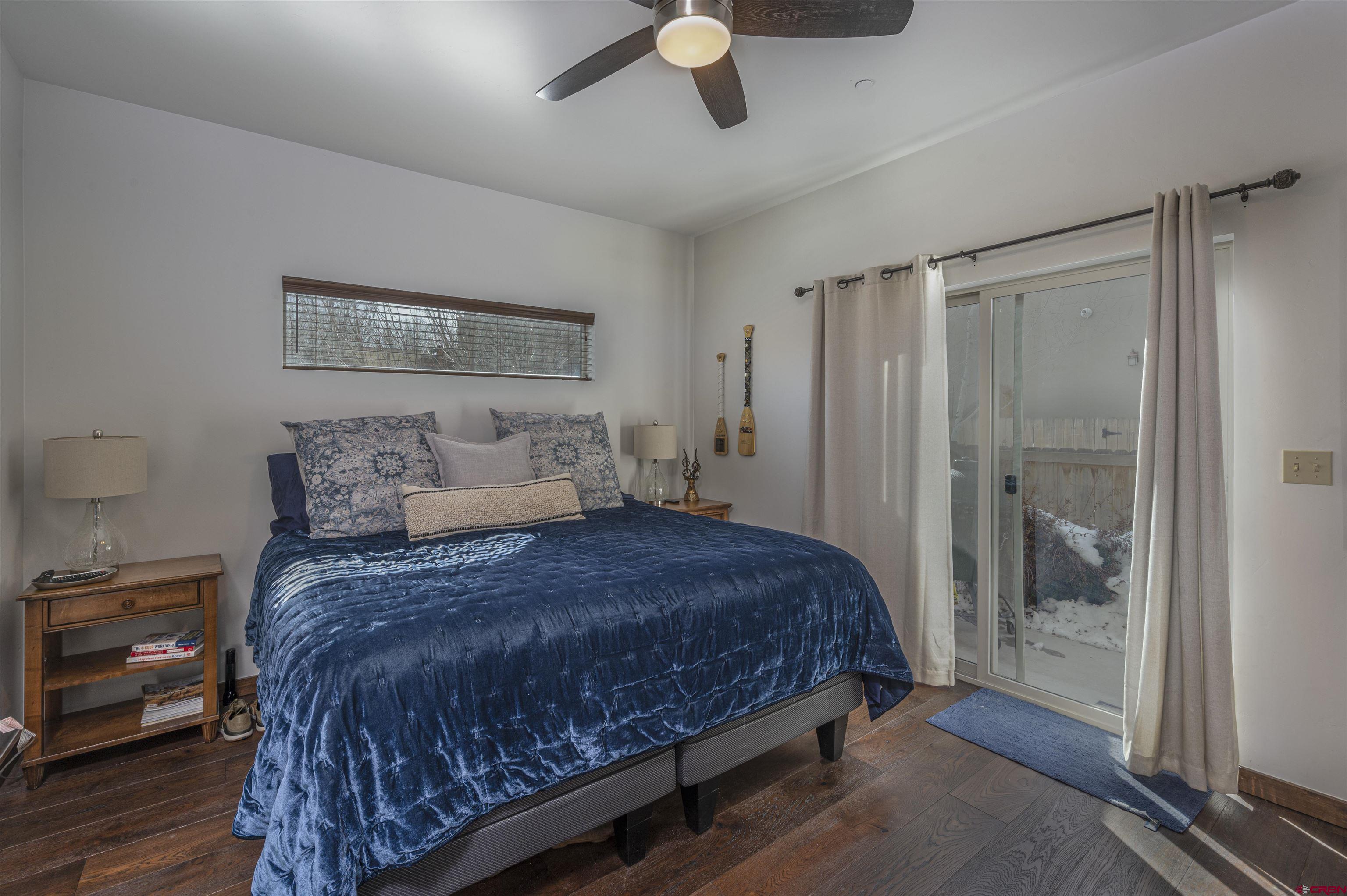 1422 Animas View Drive, Unit 24 Durango, CO 81301 - Photo 8 of 23 a bedroom with a bed and a walk in closet