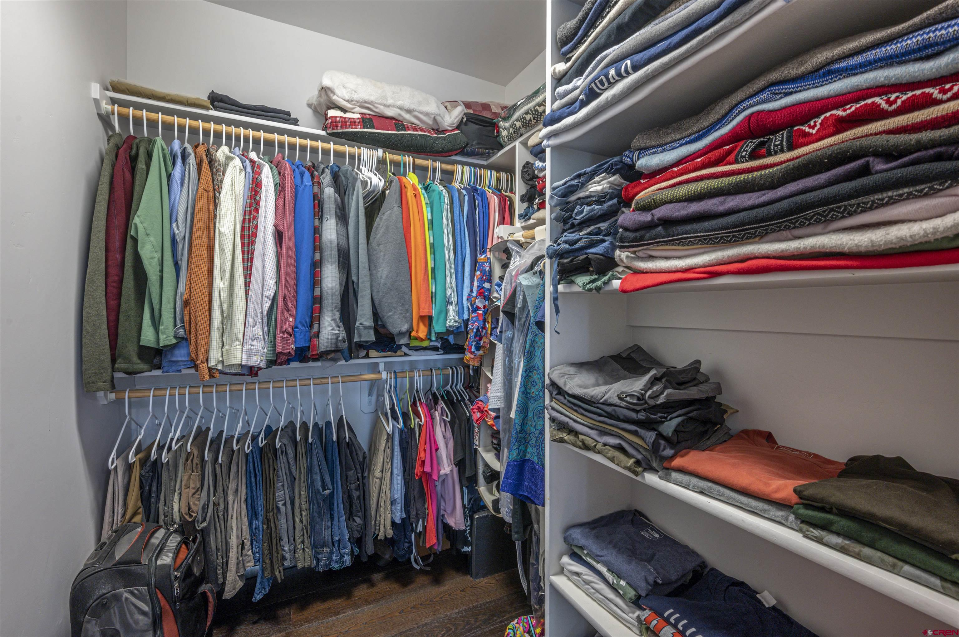 1422 Animas View Drive, Unit 24 Durango, CO 81301 - Photo 10 of 23 a view of walk in closet with clothes and shoes