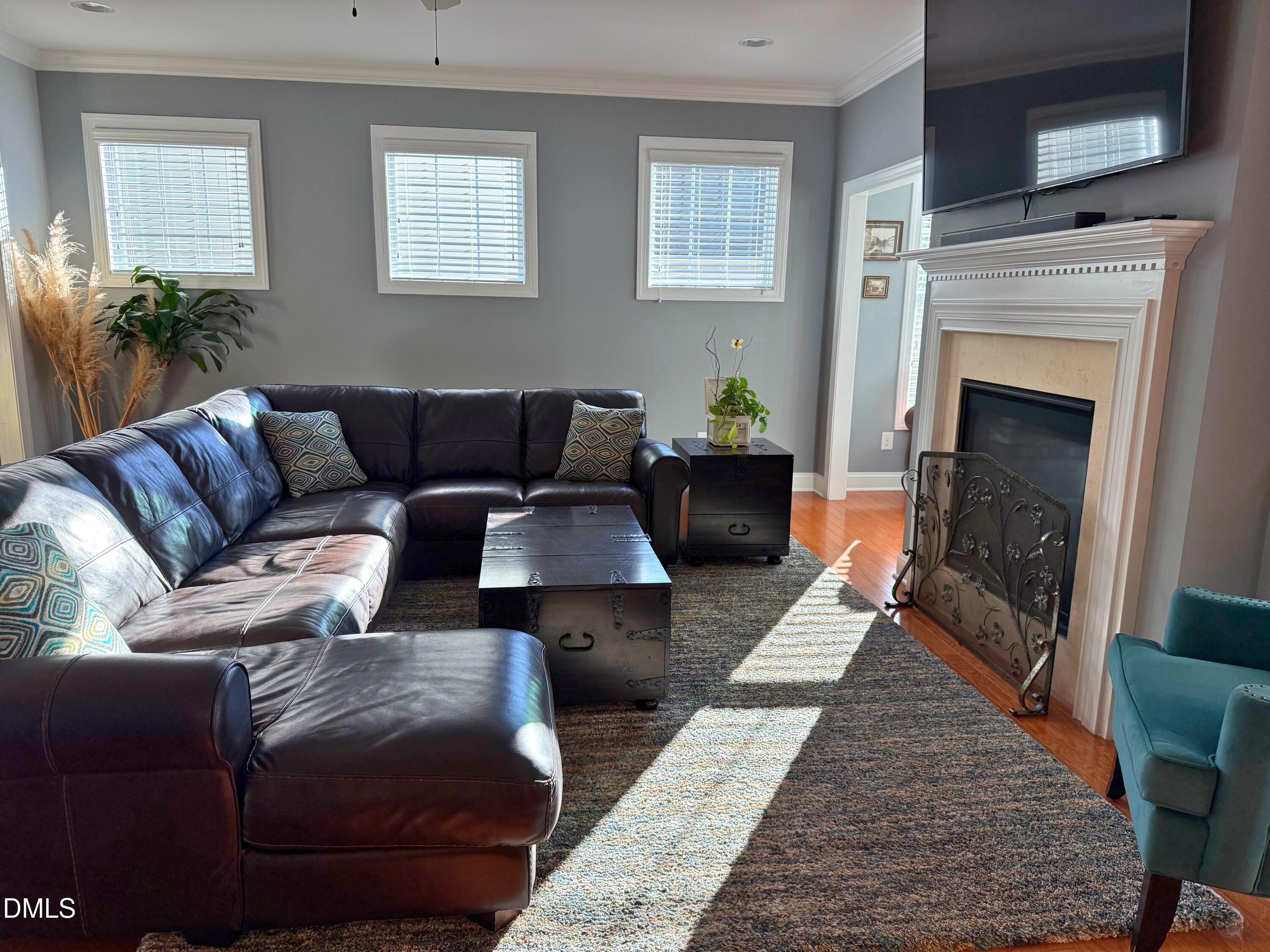 424 Powers Ferry Road Cary, NC 27519 - Photo 16 of 88 a living room with furniture fireplace and window