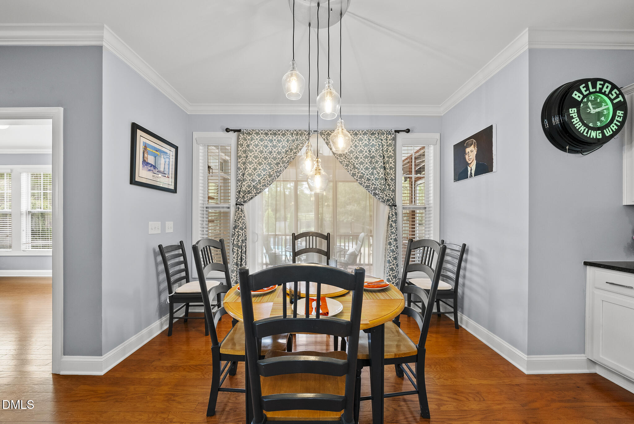 424 Powers Ferry Road Cary, NC 27519 - Photo 26 of 88 a view of a dining room with furniture window and wooden floor
