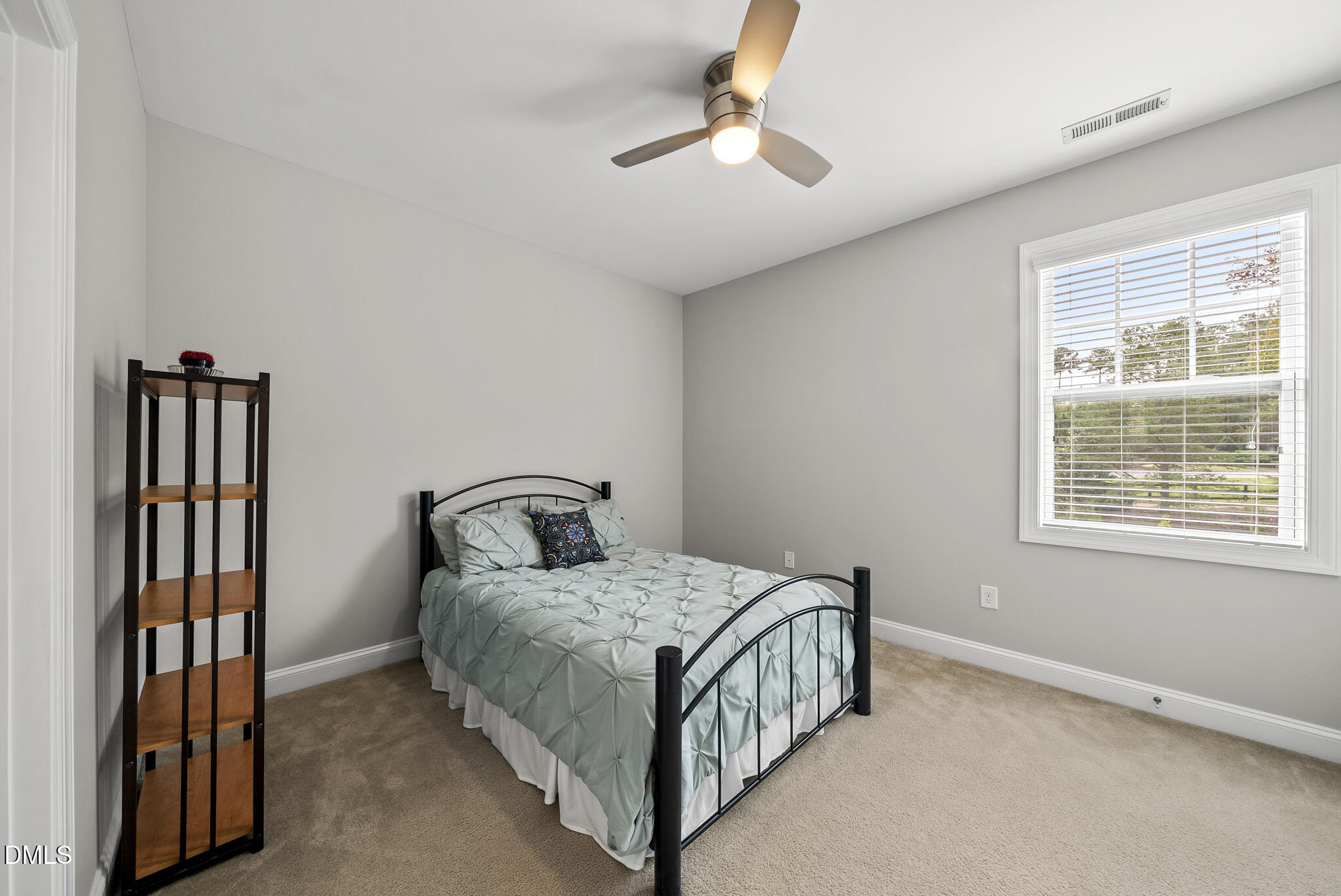 424 Powers Ferry Road Cary, NC 27519 - Photo 34 of 88 a bedroom with a bed and a window