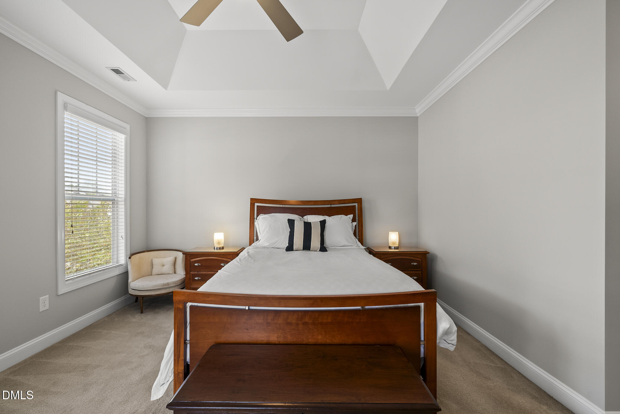 424 Powers Ferry Road Cary, NC 27519 - Photo 41 of 88 a bed sitting in a bedroom next to a window