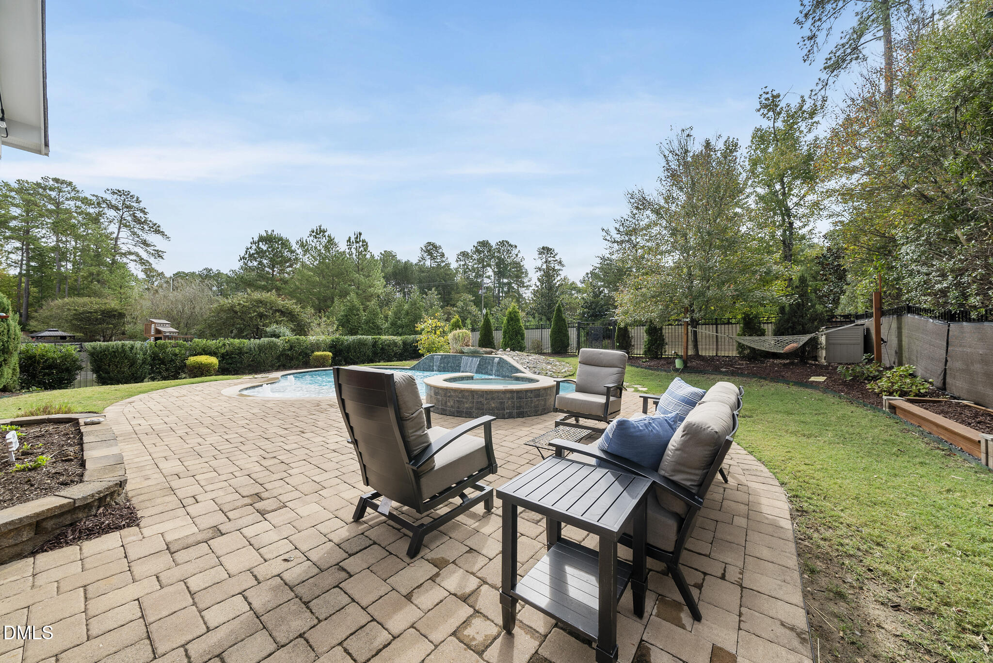 424 Powers Ferry Road Cary, NC 27519 - Photo 58 of 88 a view of backyard with seating space and trees