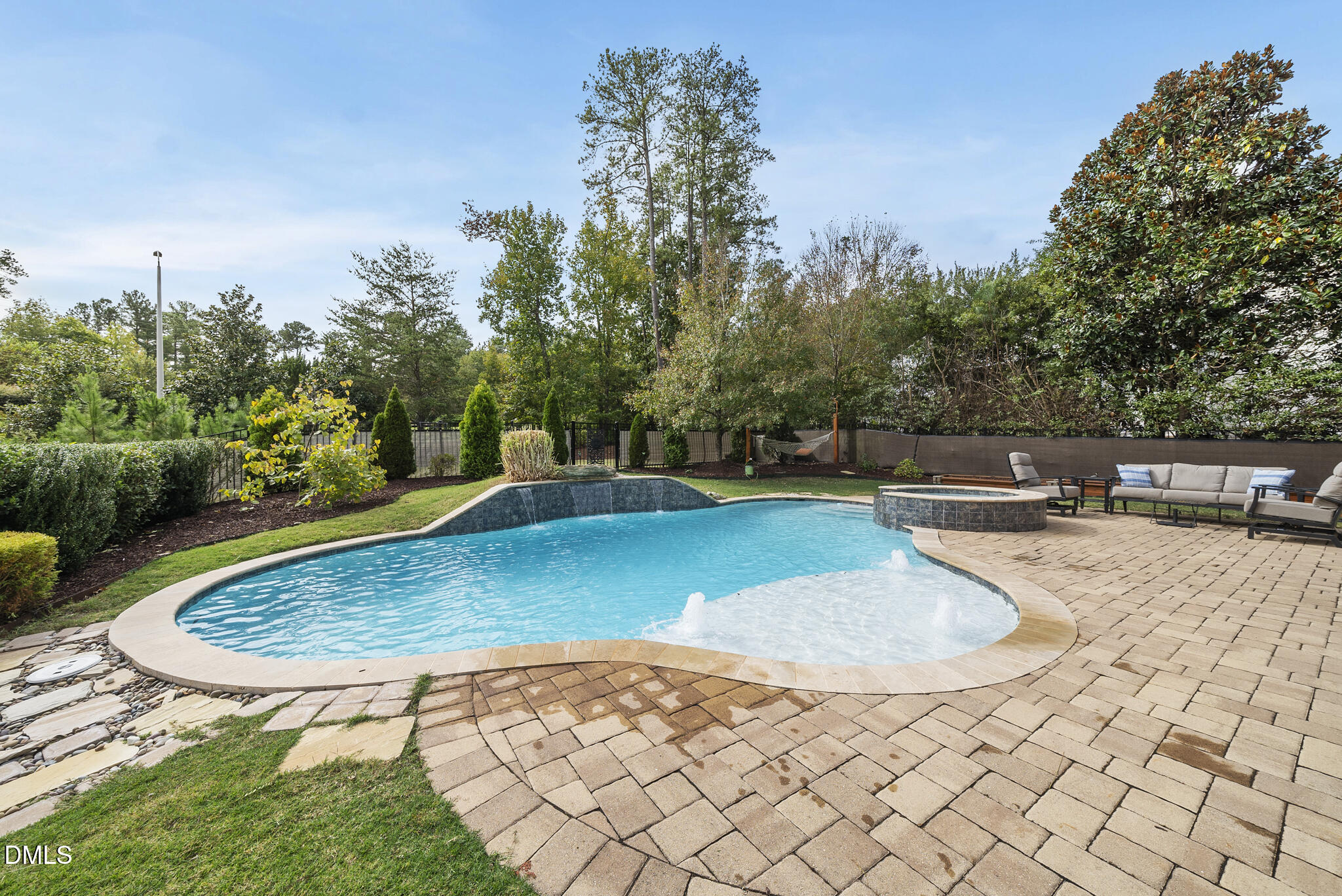 424 Powers Ferry Road Cary, NC 27519 - Photo 61 of 88 a view of a swimming pool with a patio
