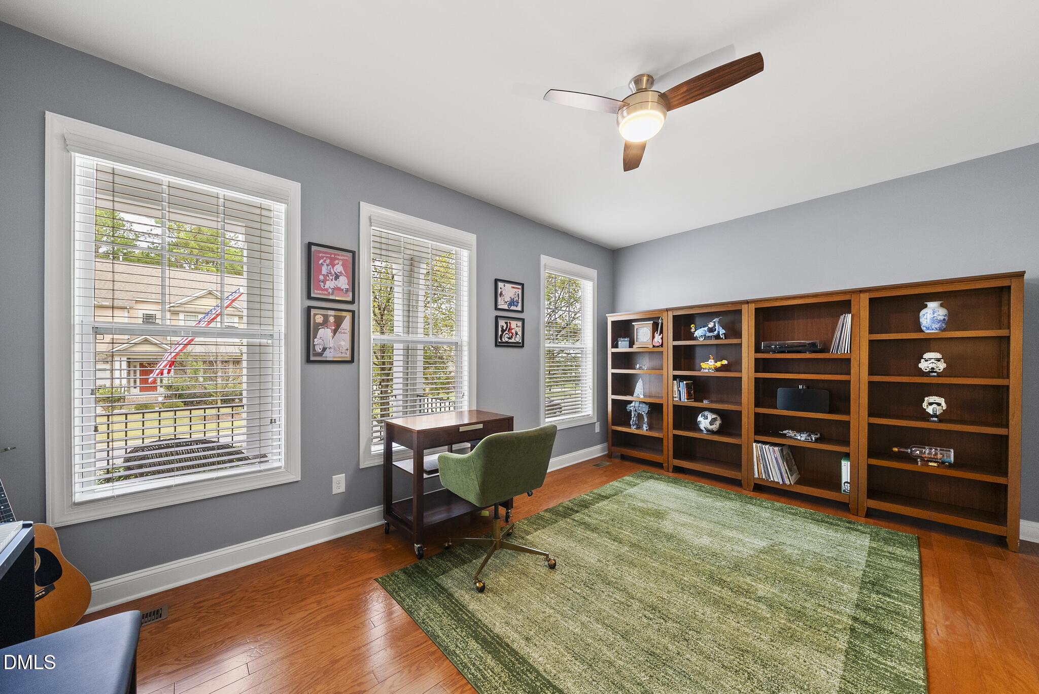 424 Powers Ferry Road Cary, NC 27519 - Photo 6 of 88 a living room with furniture and a flat screen tv