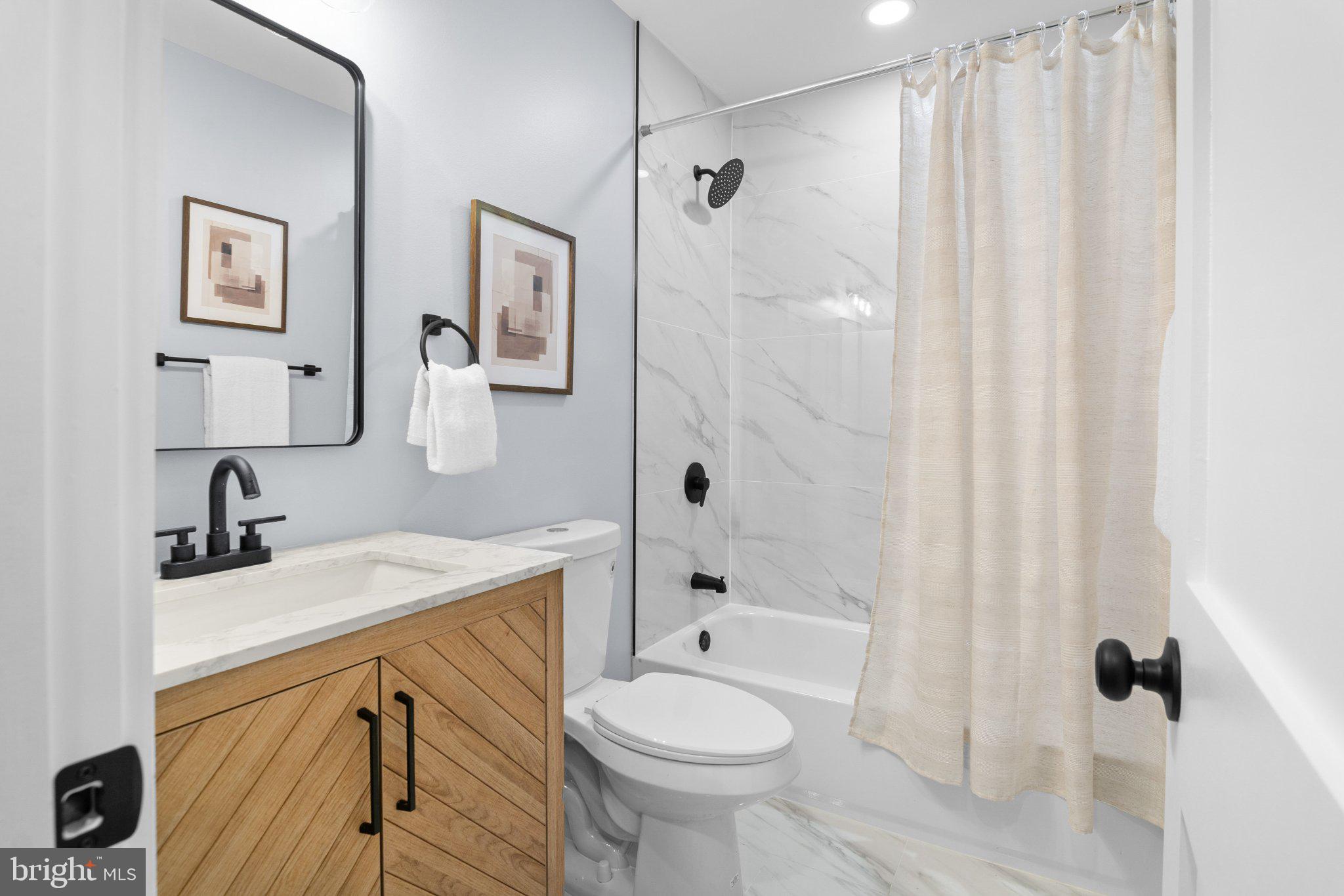 14200 Dav Road Rockville, MD 20850 - Photo 45 of 60 Stylish bathroom with modern finishes.