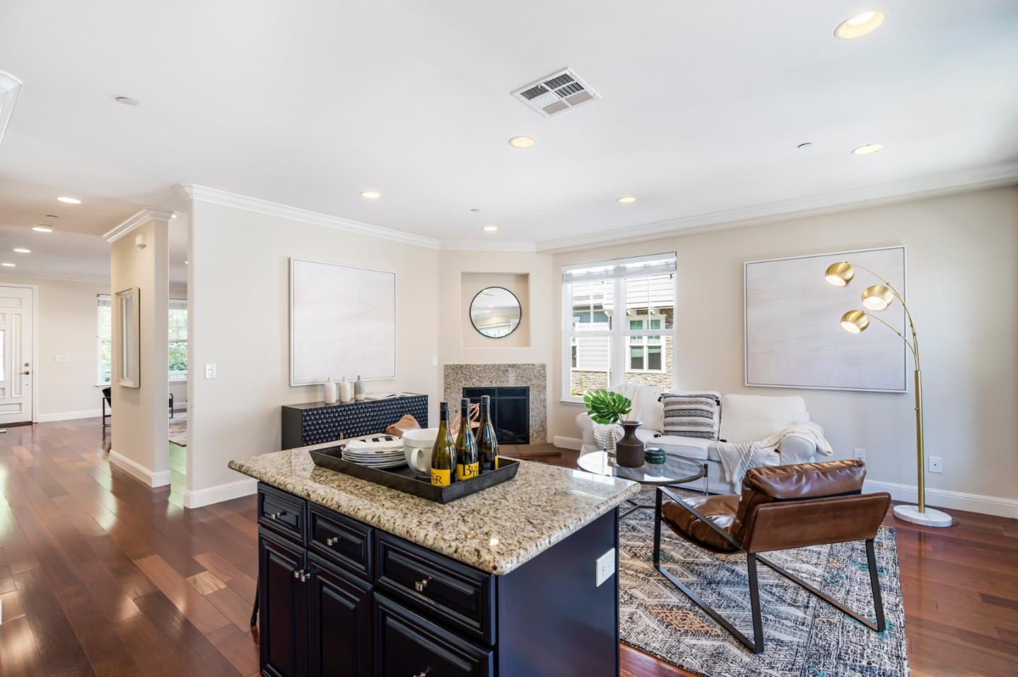 650 Willowgate Street Mountain View, CA 94043 - Photo 11 of 33 a living room with furniture a fireplace and a table