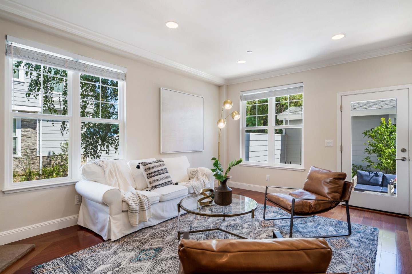 650 Willowgate Street Mountain View, CA 94043 - Photo 13 of 33 a living room with furniture and a large window