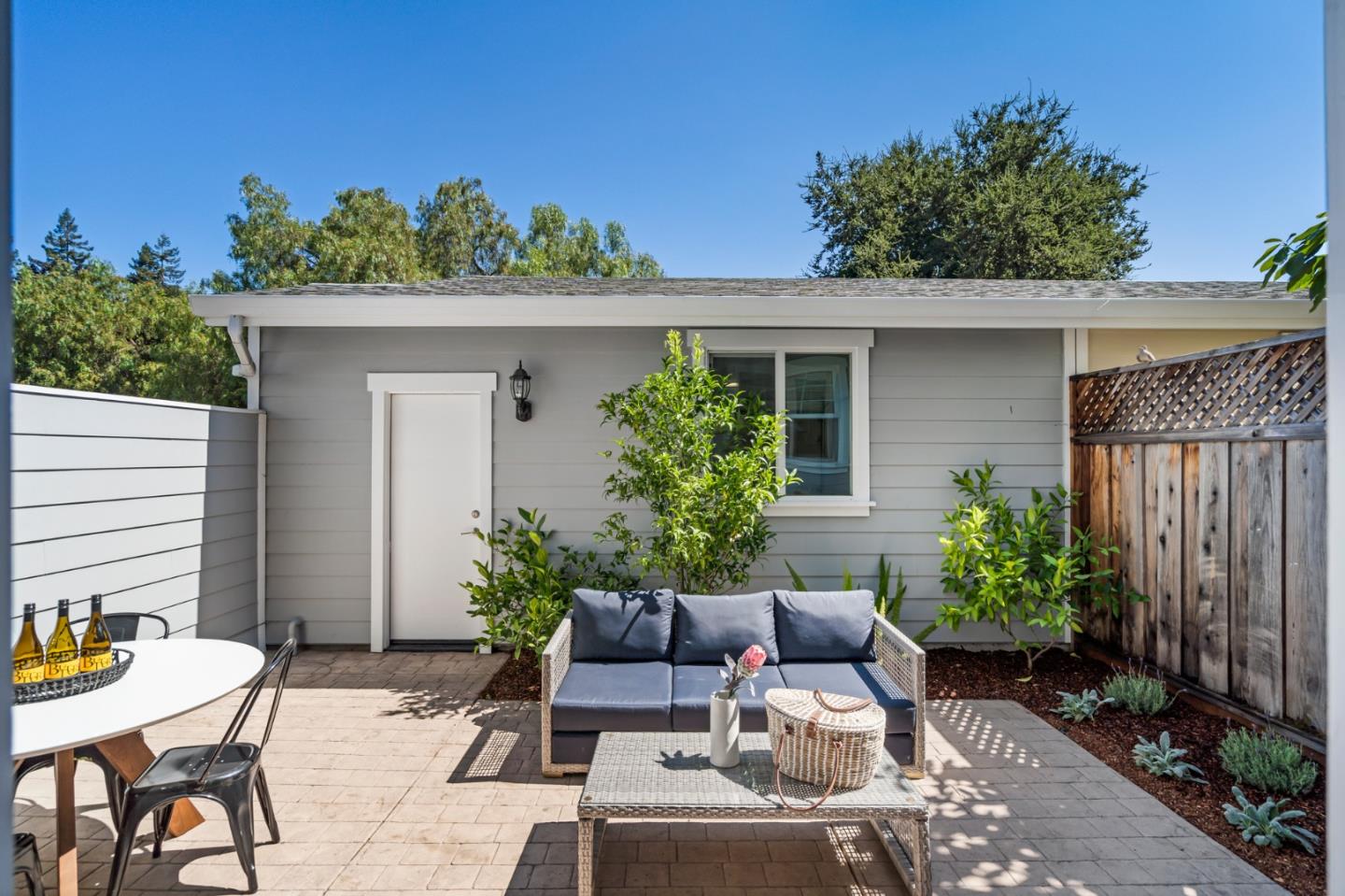 650 Willowgate Street Mountain View, CA 94043 - Photo 14 of 33 a view of a patio with plants and chairs