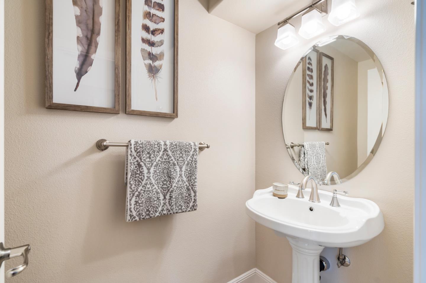 650 Willowgate Street Mountain View, CA 94043 - Photo 17 of 33 a bathroom with a sink and mirror