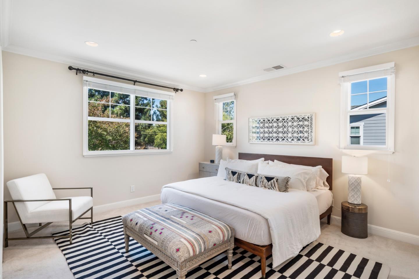 650 Willowgate Street Mountain View, CA 94043 - Photo 19 of 33 a bedroom with a bed and wooden floor