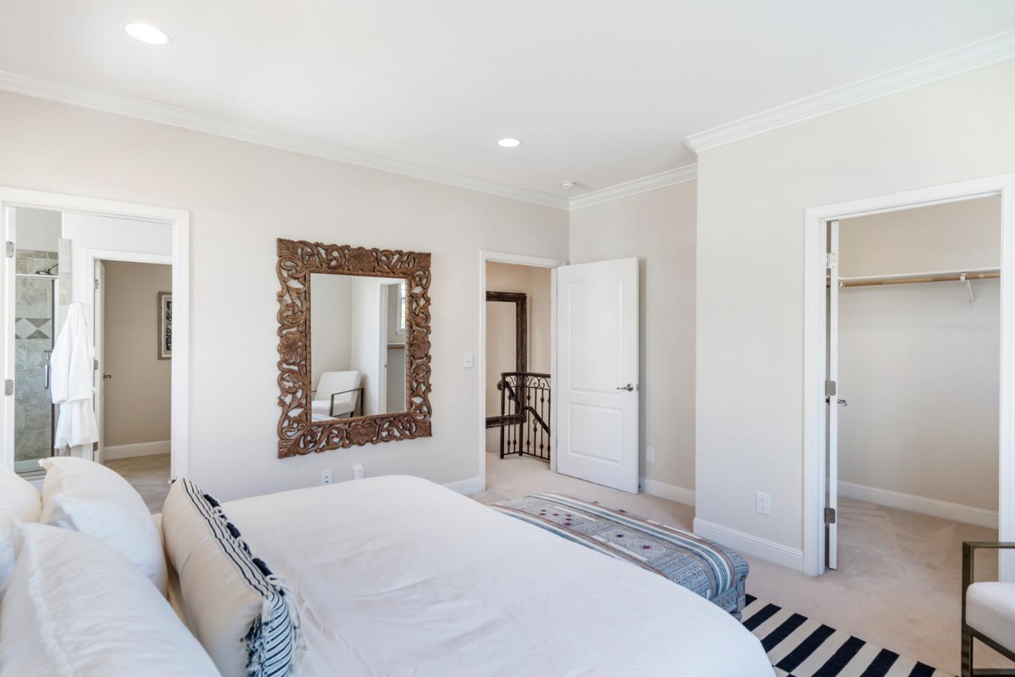 650 Willowgate Street Mountain View, CA 94043 - Photo 20 of 33 a bedroom with a bed and a large mirror