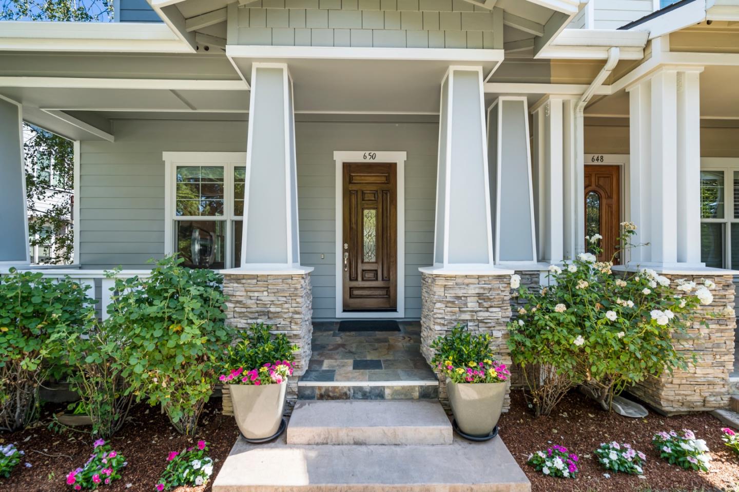 650 Willowgate Street Mountain View, CA 94043 - Photo 2 of 33 a front view of a house with a garden