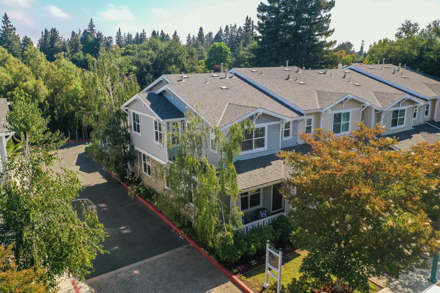 650 Willowgate Street Mountain View, CA 94043 - Photo 30 of 33 an aerial view of a house with yard and trees in the background