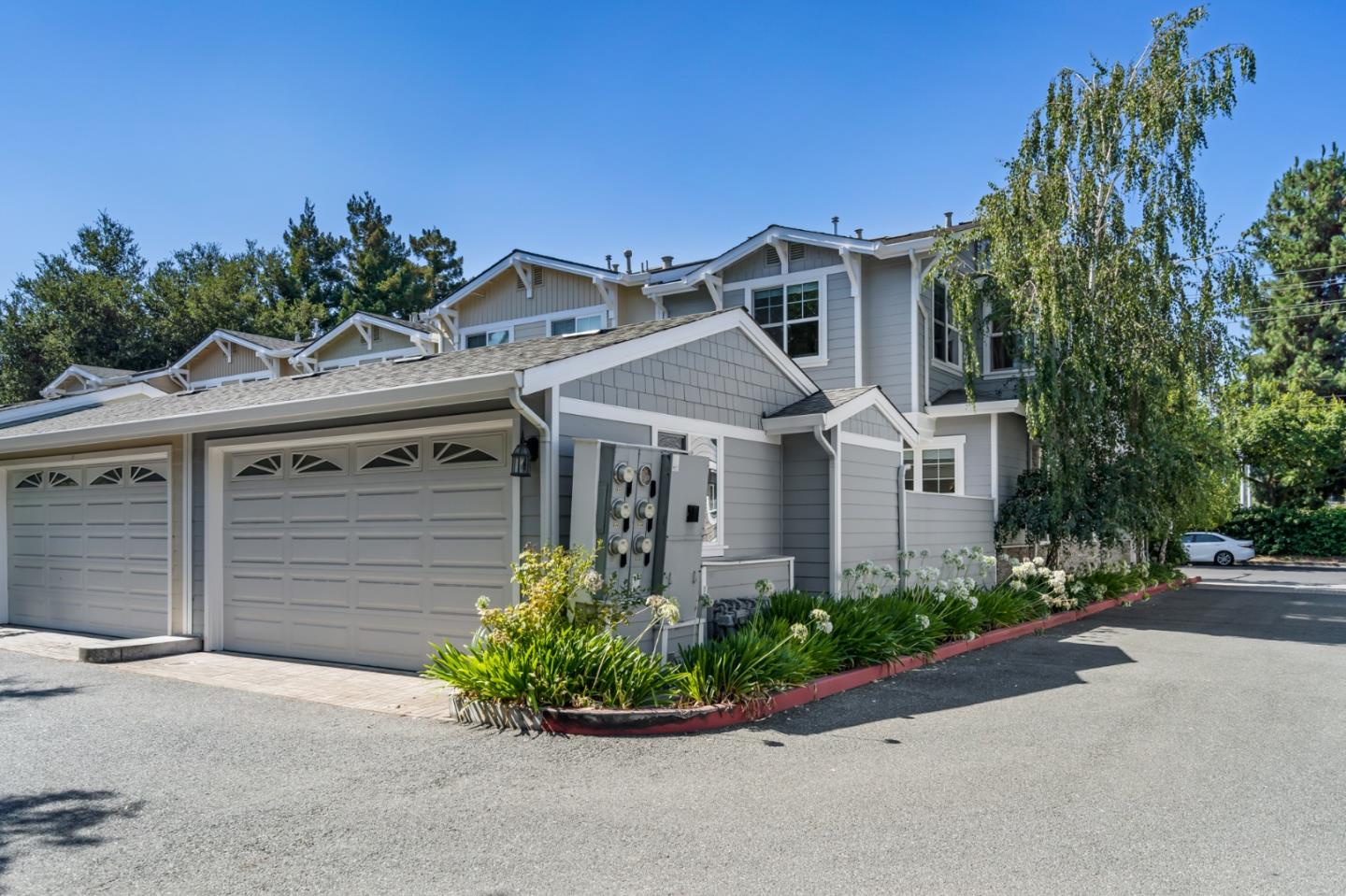 650 Willowgate Street Mountain View, CA 94043 - Photo 31 of 33 a front view of a house with a yard and garage
